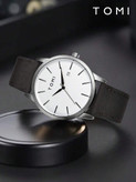 ساعت مردانه TOMI با طراحی مینیمال، صفحه گرد و عقربهای، نمایش تاریخ دقیق – ساده، خوانا و مناسب برای استفاده روزمره