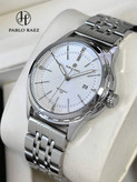اعت کوارتز مردانه پابلوریز مدل 95769981 با طراحی کلاسیک، بند استیل ضد زنگ، صفحه مشکی با عقربههای شبتاب، مقاوم در برابر آب تا 50 متر، مناسب برای استفاده روزمره و رسمی