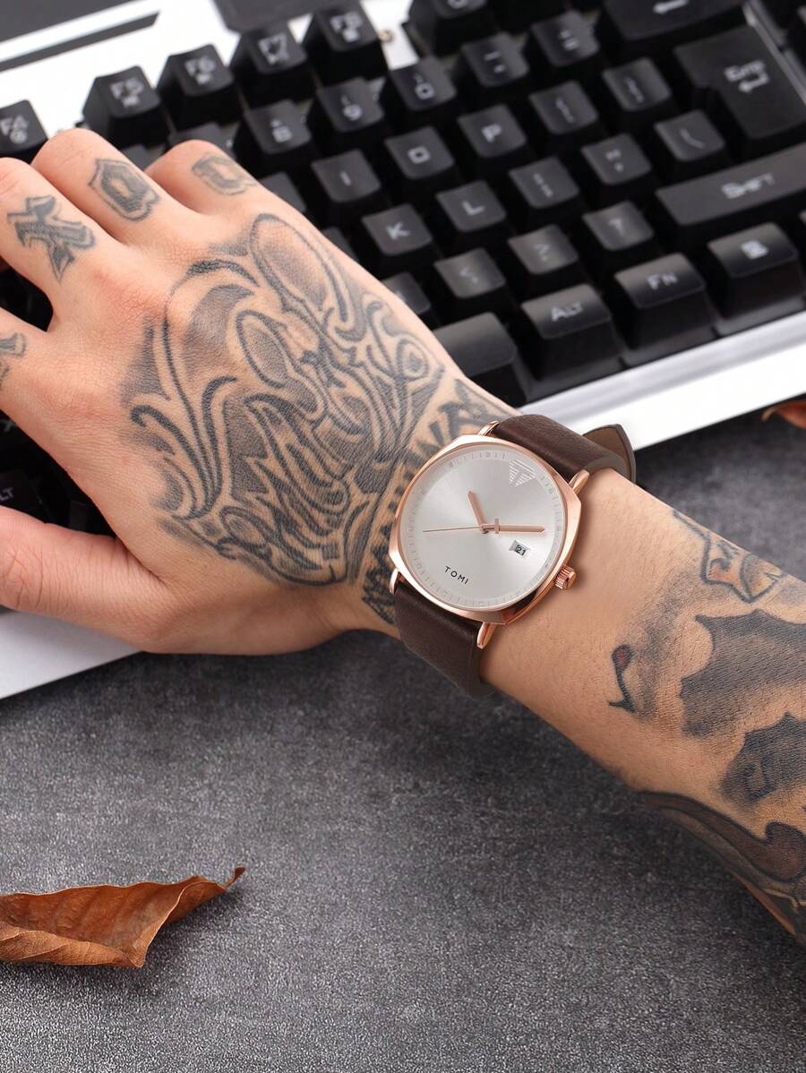 ساعت کوارتز مردانه TOMI با صفحه گرد، عقربه‌ای و نمایش تاریخ