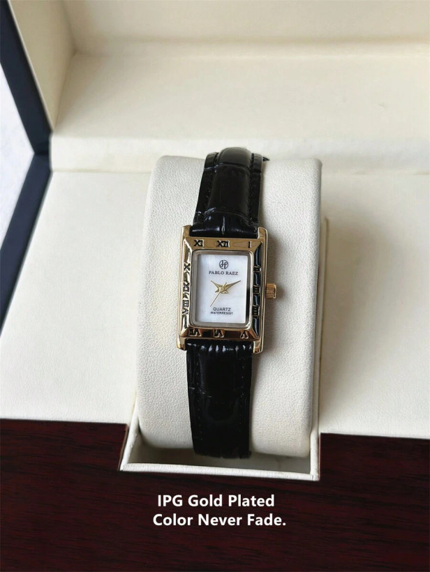 ساعت کوارتز زنانه وینتیج Pablo Raez با بدنه مستطیلی طلایی، صفحه صدفی سفید، بند چرمی مشکی تنفسی، ضدآب تا عمق ۵۰ متر—لوکسی مجلل برای استفاده رسمی و روزمره.